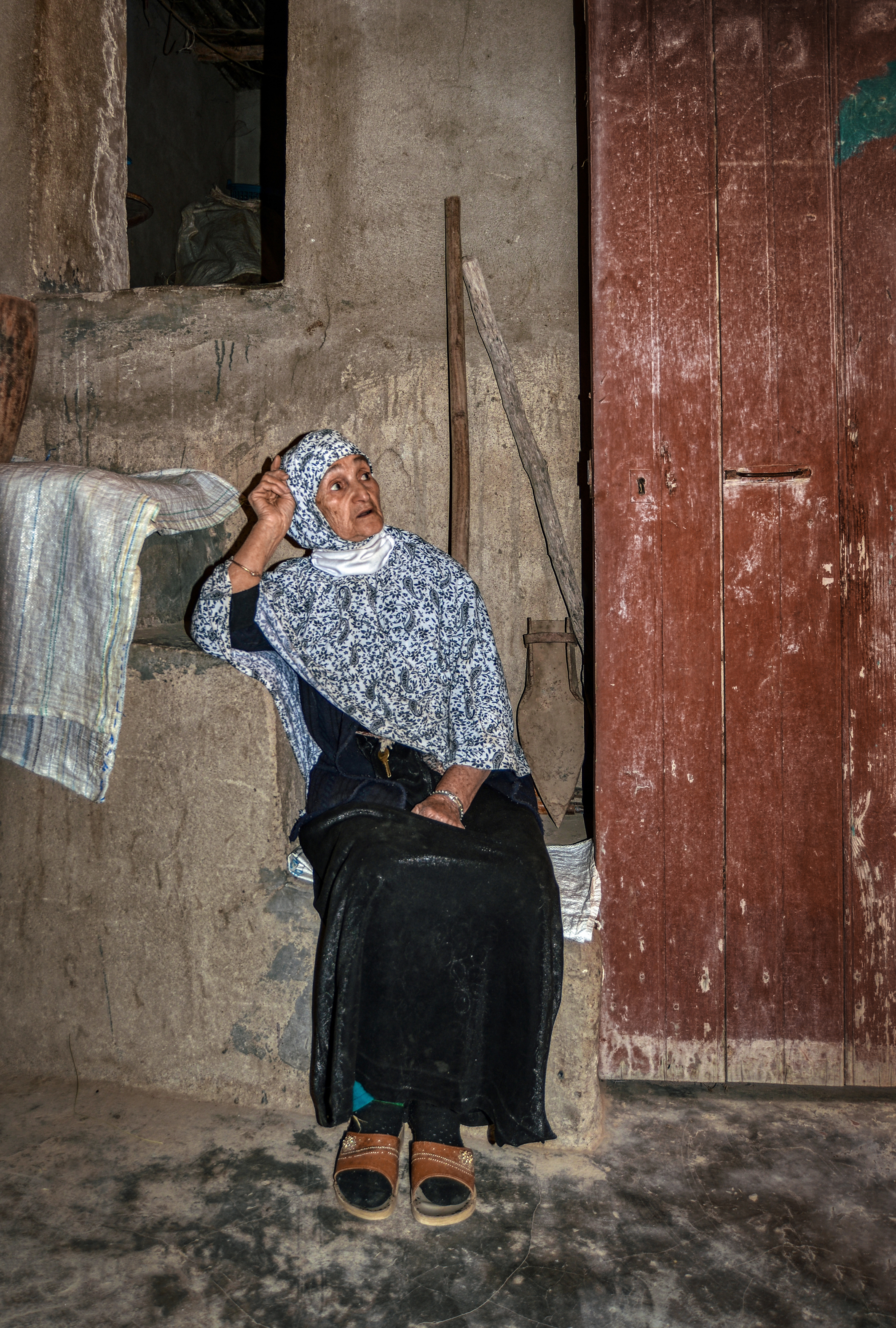 Older woman sitting at home